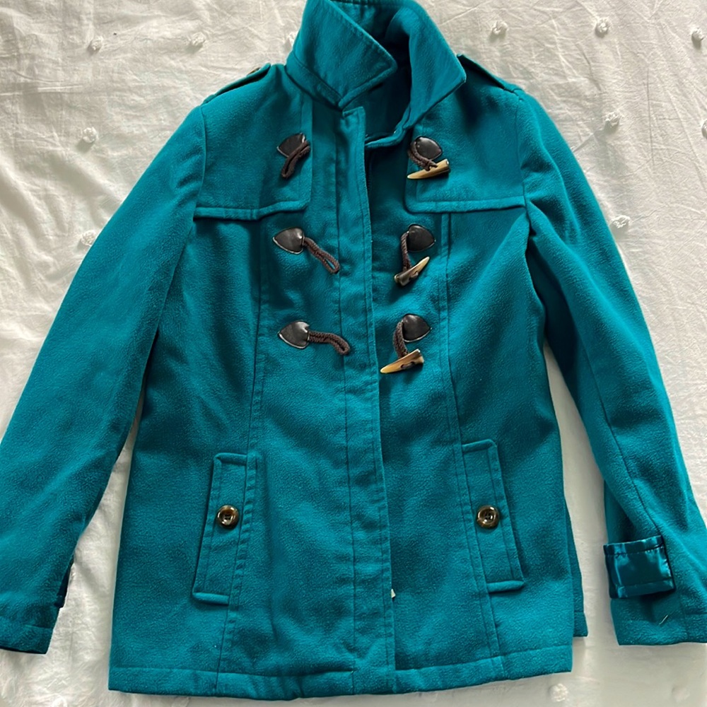 Winter coat size L. Gently worn. Small tear in the liner on the back.